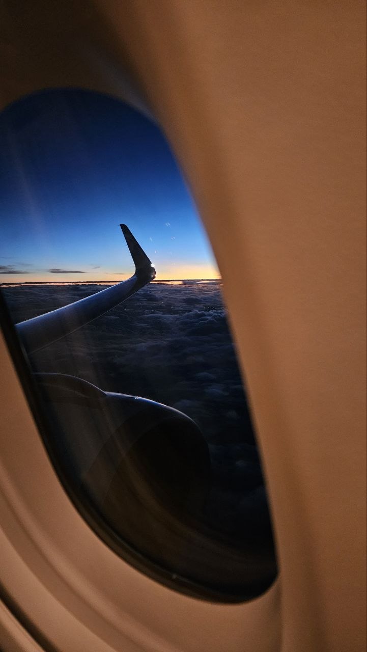Airbus A321XLR Iberia classe executiva janela pôr do sol acima das nuvens
